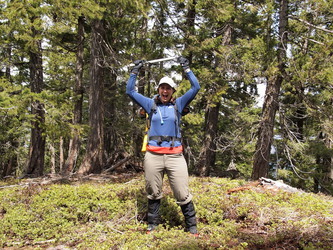 Image of On the summit.  Lindsay is the queen of Monahan Mountain!