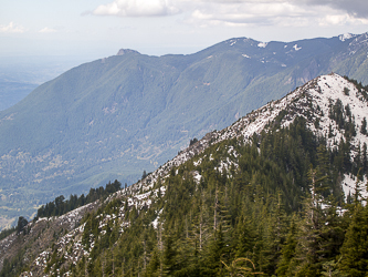 The summit of Mailbox Peak with Mount Si in the background.