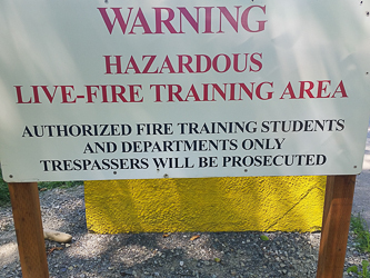 Oops.  I didn't know I wasn't allowed to enter, although I should have guessed it.  I bushwacked around the Fire Training Center.