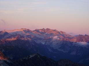 Sunset on Mount Hinman and Mount Daniel from summit of Big Snow Mountain