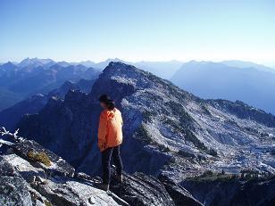 Atsuko looking at the exposure on the S side of Granite Mountain (The Cradle quad) with South Granite Mountain in the background