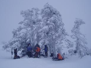 UW Climbers, Seattle Mountaineers, and a lone Bushwacker take lunch below the summit of Mount Persis