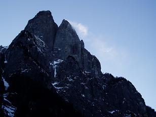 Snow blowing off the north face of Baring Mountain