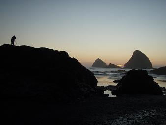 Photographing the sunset at Tunnel Beach