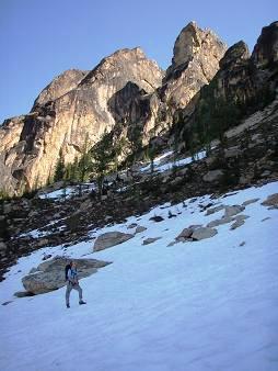 Ian studying the SW buttress route (Liberty Bell in the background)