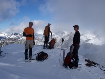 Iron, Dicey, and Yana on the summit of Boulder BM