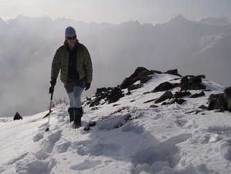 Holly arrives at the summit