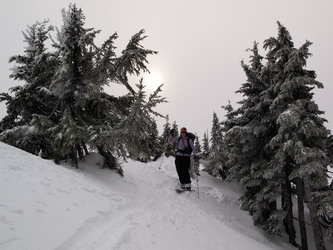 Lindsay skiing off the summit of point 5,360.