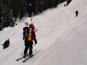 Skiing down the very, very well used path below Source Lake.