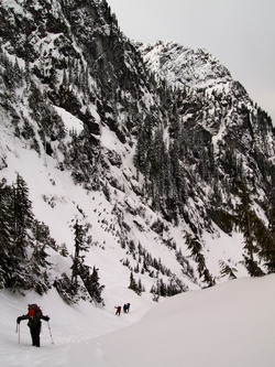 Climbing the steep slopes at the head of the Perry Creek Basin.