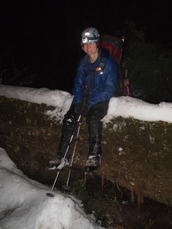 There is nothing better than sitting on a snowy log in the dark