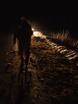 Matt silhouetted by our car headlights.  I was really looking forward to the heater warming up.