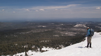 Lindsay looking off the east side of Tumalo Mountain's summit