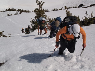 Ascending the steep SW slope below the north summit.