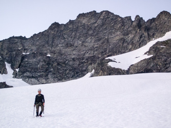 We are finally off the ridge and down the snow finger.  Forbidden Peak in the background