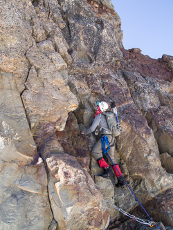 Tristan leading the 30 meter rock route that leads directly to the rap station on the north side of the peak.  The crux of the climbing was moving from the snow, over the moat, and onto the rock