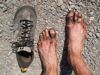 My feet at the end of the trip (I know everyone wants to see that).  I did an experiment and did not wear socks for the whole 55 mile trip.  I learned that socks are not as necessary as I thought, but I did get some abrasions on the top of a few of my toes.