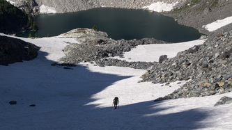 Ascending the snow slopes NE of Iceberg Lake.