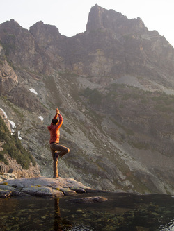 Early morning yoga below Chikamin Lake.  The SE towers of Lemah are in the background.