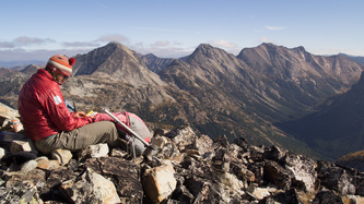 Lindsay on the summit of Mount Rolo.  Osceola, Carru, and Lago in the background.