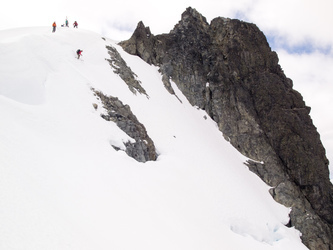 Dropping off the top of Mount Daniel onto the Lynch Glacier.