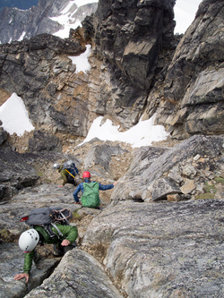 Descending from the summit of Snowfield down to the notch leading to the lower gully.