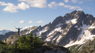 On the summit of point 7004 with Mount Formidable in the background.