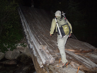 A broken, but useable bridge over Fisher Creek.