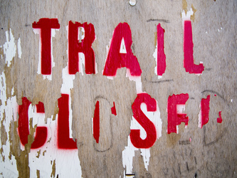 Signs on the Timberline Trail on the north side of the Elliot