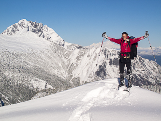 Steph on the summit of Higher Squire.  Whitehorse Mountain in the background.