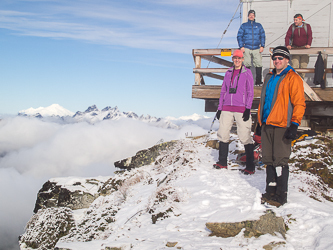 Tom and Janet waiting at the top.