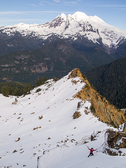 Mount Baker over Mythic Peak's east ridge.