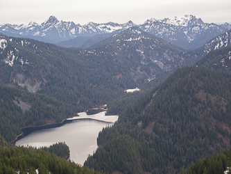 Snoqualmie Lake with Mount Thomson, Sorcery Mountain, and Snoqualmie Mountain in the background.