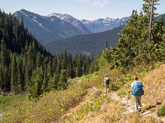 Descending the Frosty Creek Trail.  Sixtysix Hundred Ridge (left), The Cradle, and Paddy-Go-Easy Pass in the background.