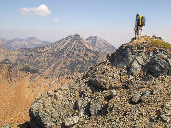 On the summit of Scatter Benchmark, looking at Solomon Mountain.