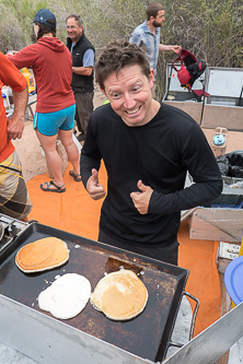 Clay enthusiastically making pancakes