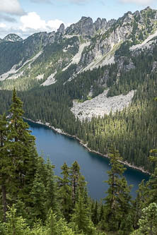 Nimbus Mountain and Slippery Slab Tower over Glacier Lake