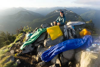 Drying our very dewy gear -- including my camera lens.